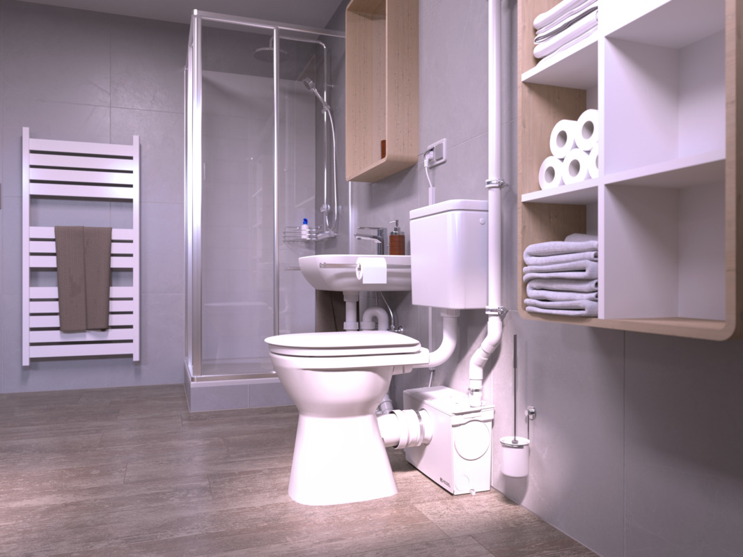 Tuvaletin yakın çekimi; tuvaletin arkasında, duşun da bağlı olduğu küçük bir pompa sistemi bulunuyor.