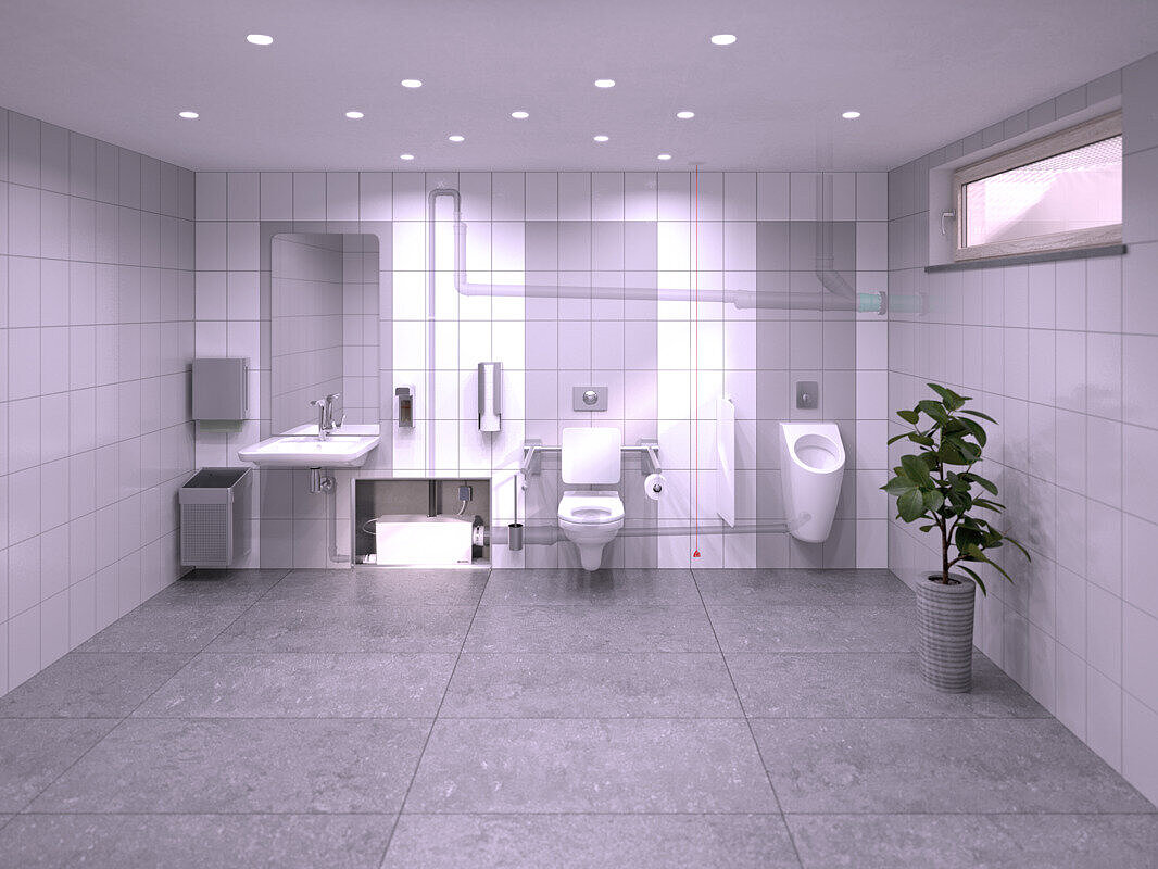 Bir restoranın bodrum katındaki tuvaletin kurulum şeması; burada bir lavabo, bir pisuar ve bir klozet, duvar arkası tesisatında gizlenmiş olan Minilift L WC Duo küçük kaldırma sistemine bağlanmıştır.
